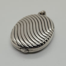 Load image into Gallery viewer, Antique Sterling Silver Sliding Locket.