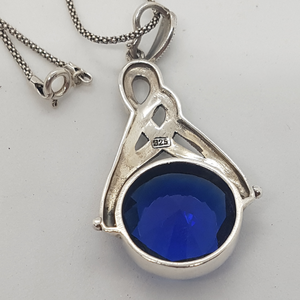 Sterling Silver Marcasite and Blue Stone Pendant