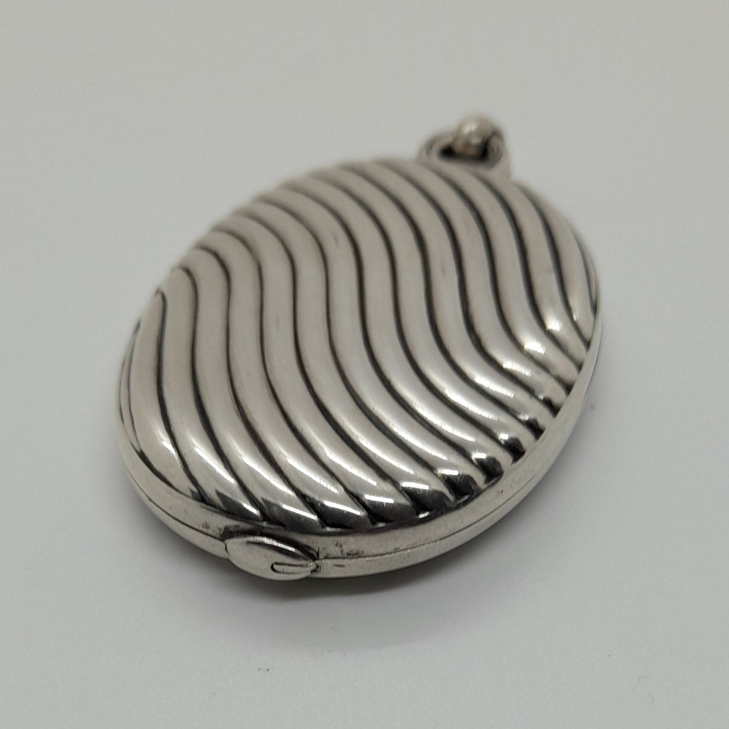 Antique Sterling Silver Sliding Locket.